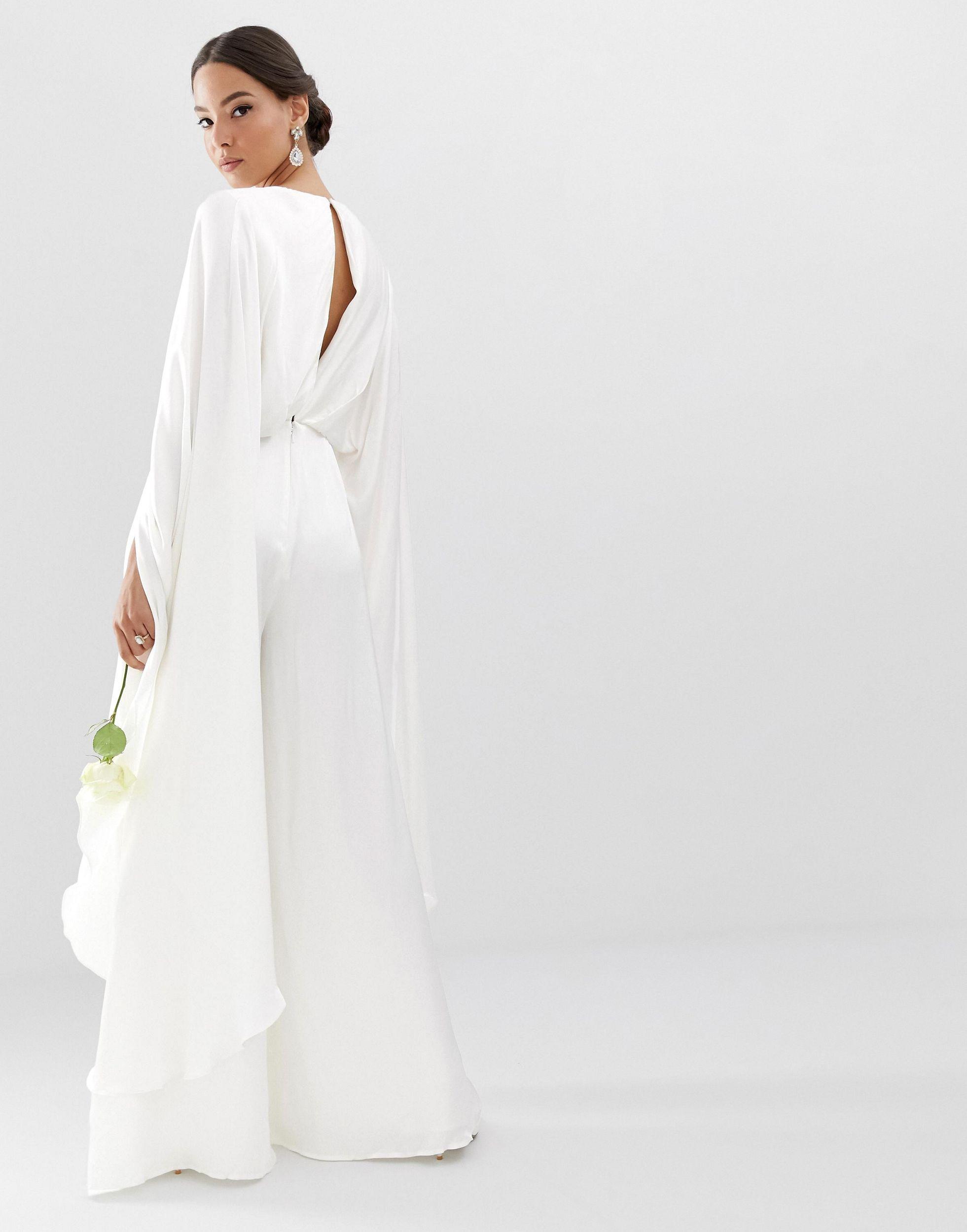 white jumpsuit with cape wedding