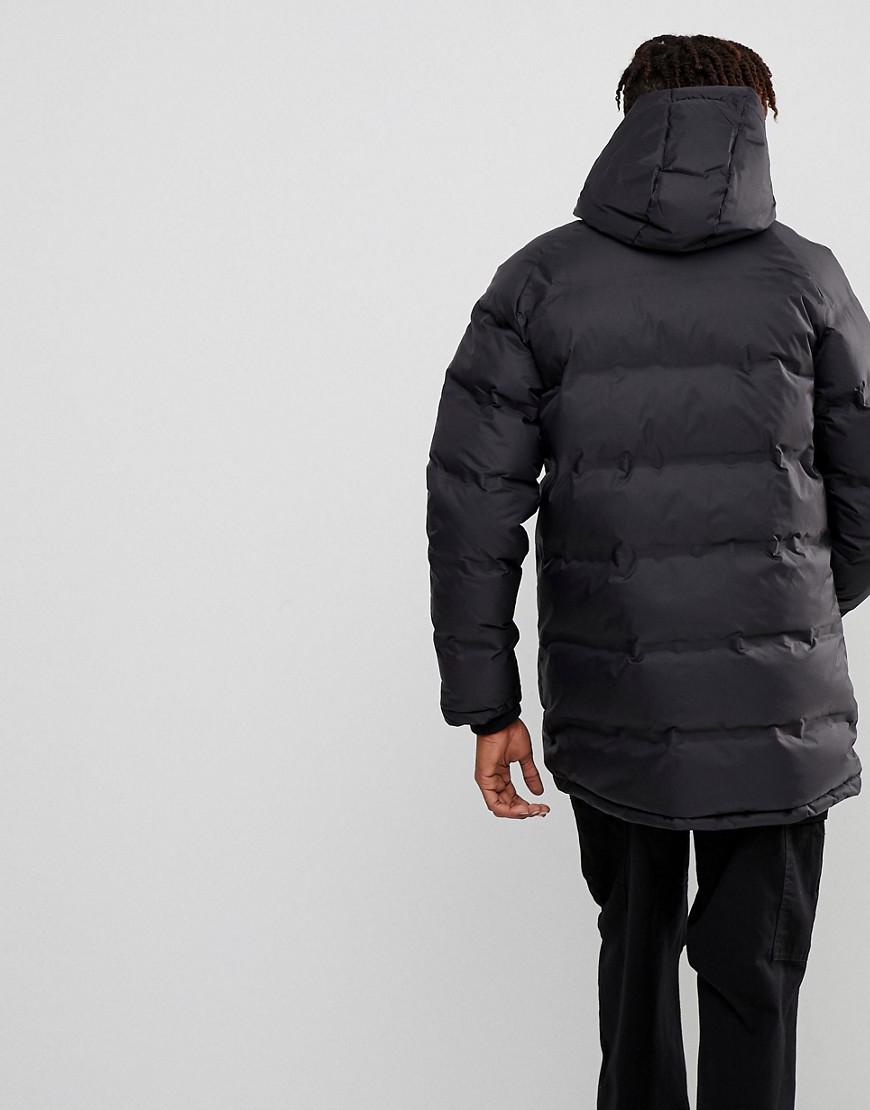 Champion Long Puffer Jacket With Logo in Black for Men | Lyst