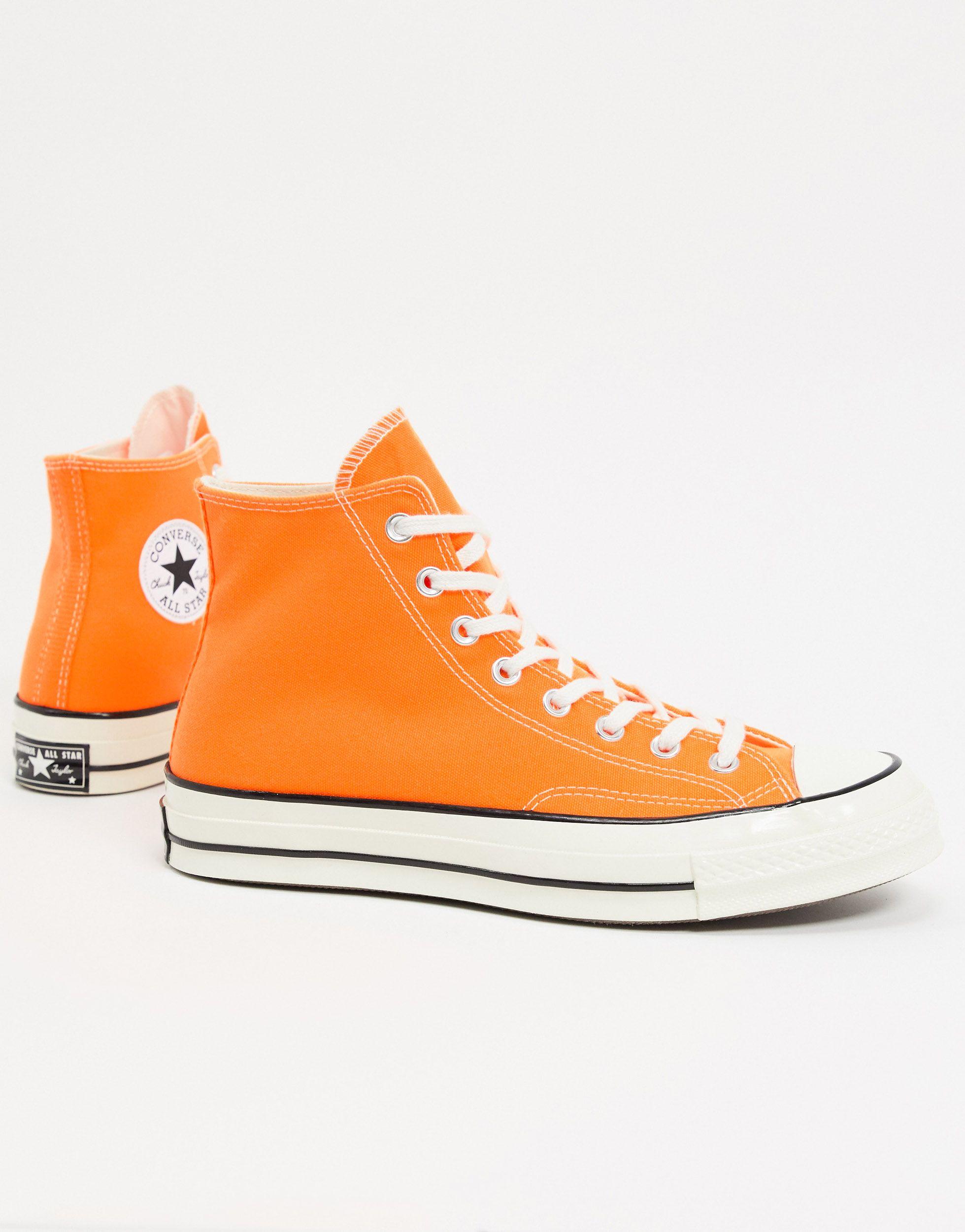 white and orange converse