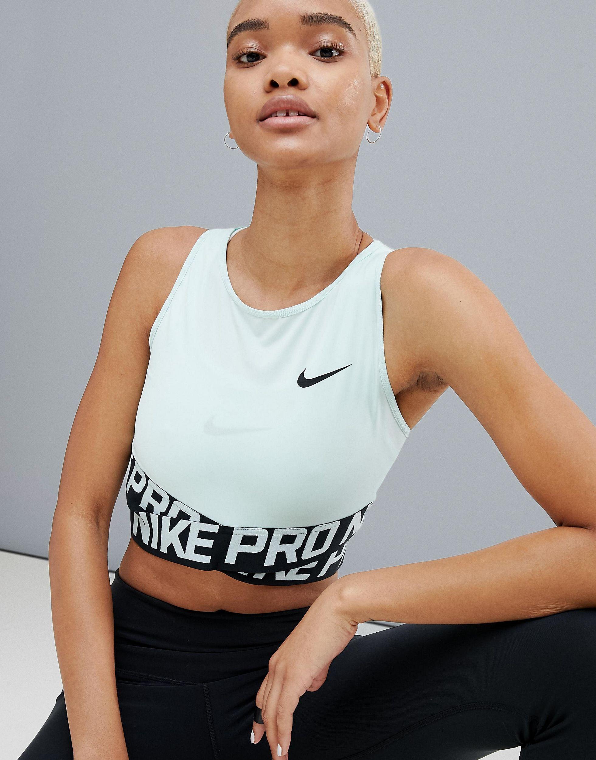 Nike Nike Pro Training Crossover Crop Top in Green | Lyst Australia