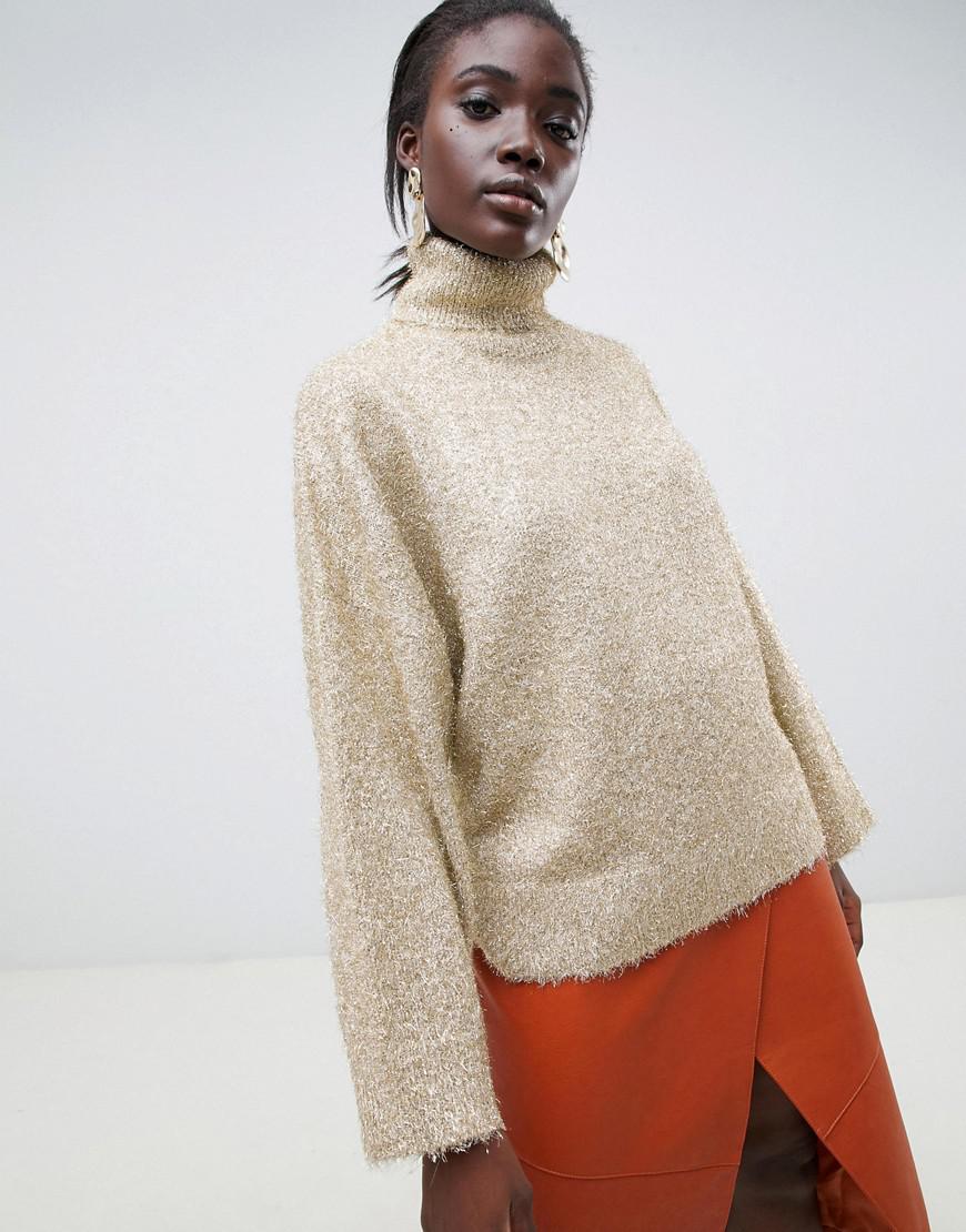 gold roll neck jumper
