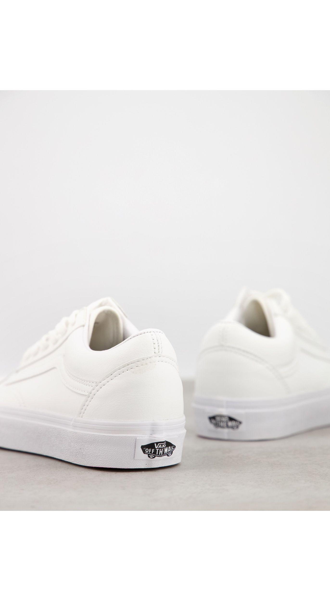 white faux leather vans