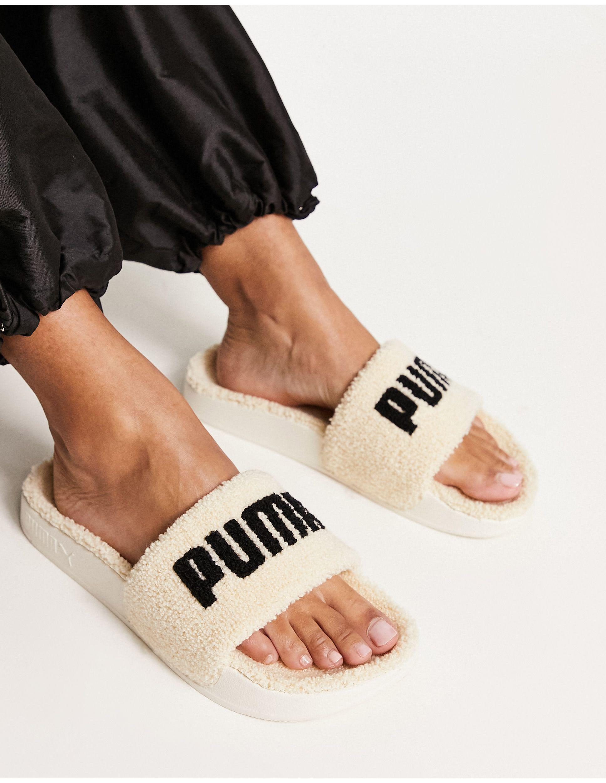 PUMA Sherpa Leadcat Slides in Black Lyst