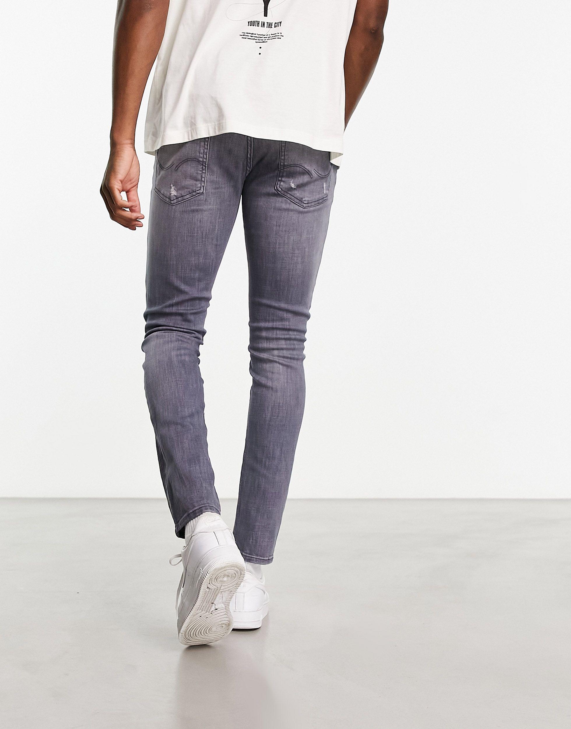 Jack & Jones Intelligence Liam Super Stretch Skinny Fit Jeans With Rip And  Repair in White for Men | Lyst