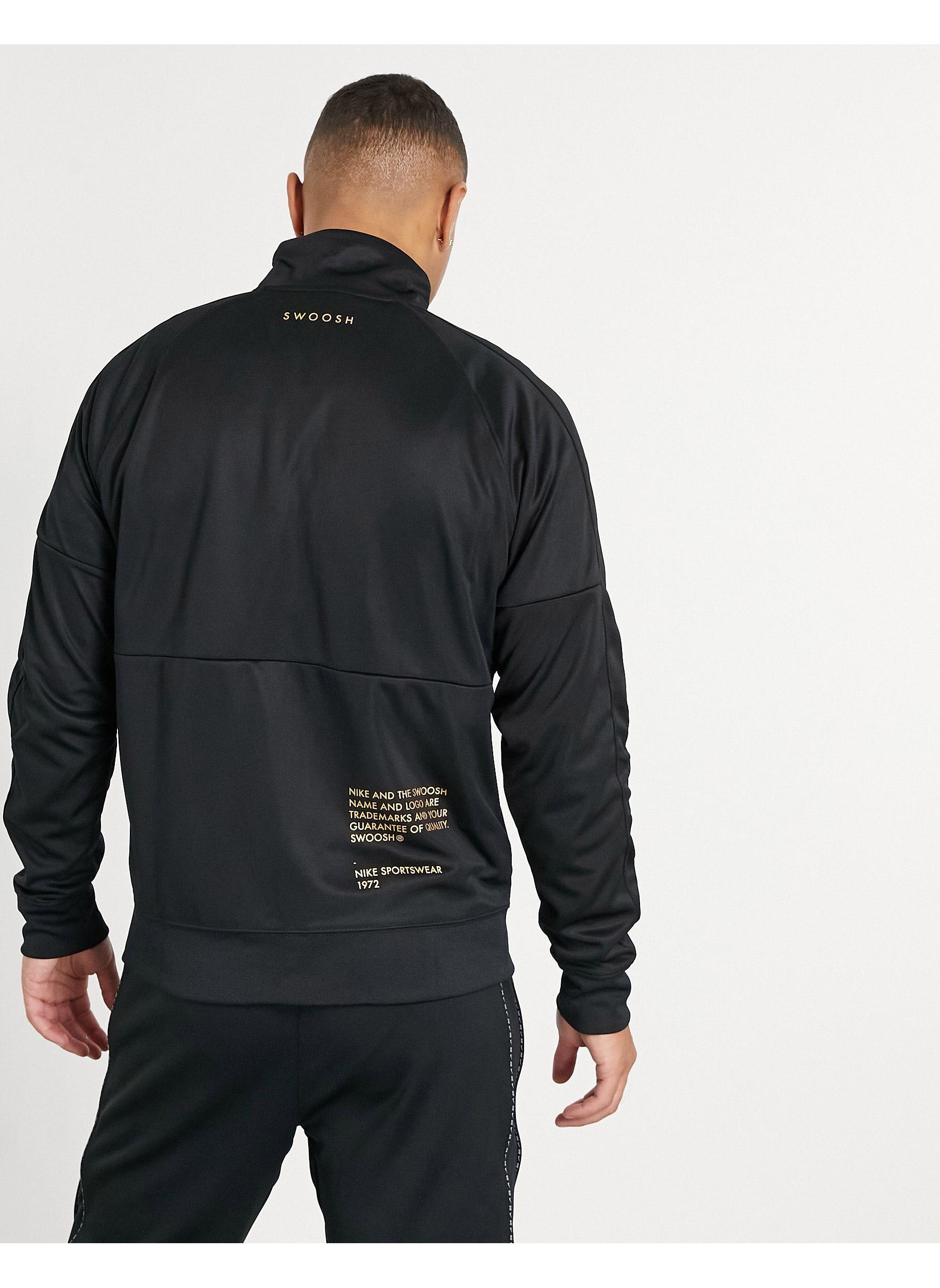 Giacca sportiva nera e oro con logo da Uomo di Nike in Nero | Lyst
