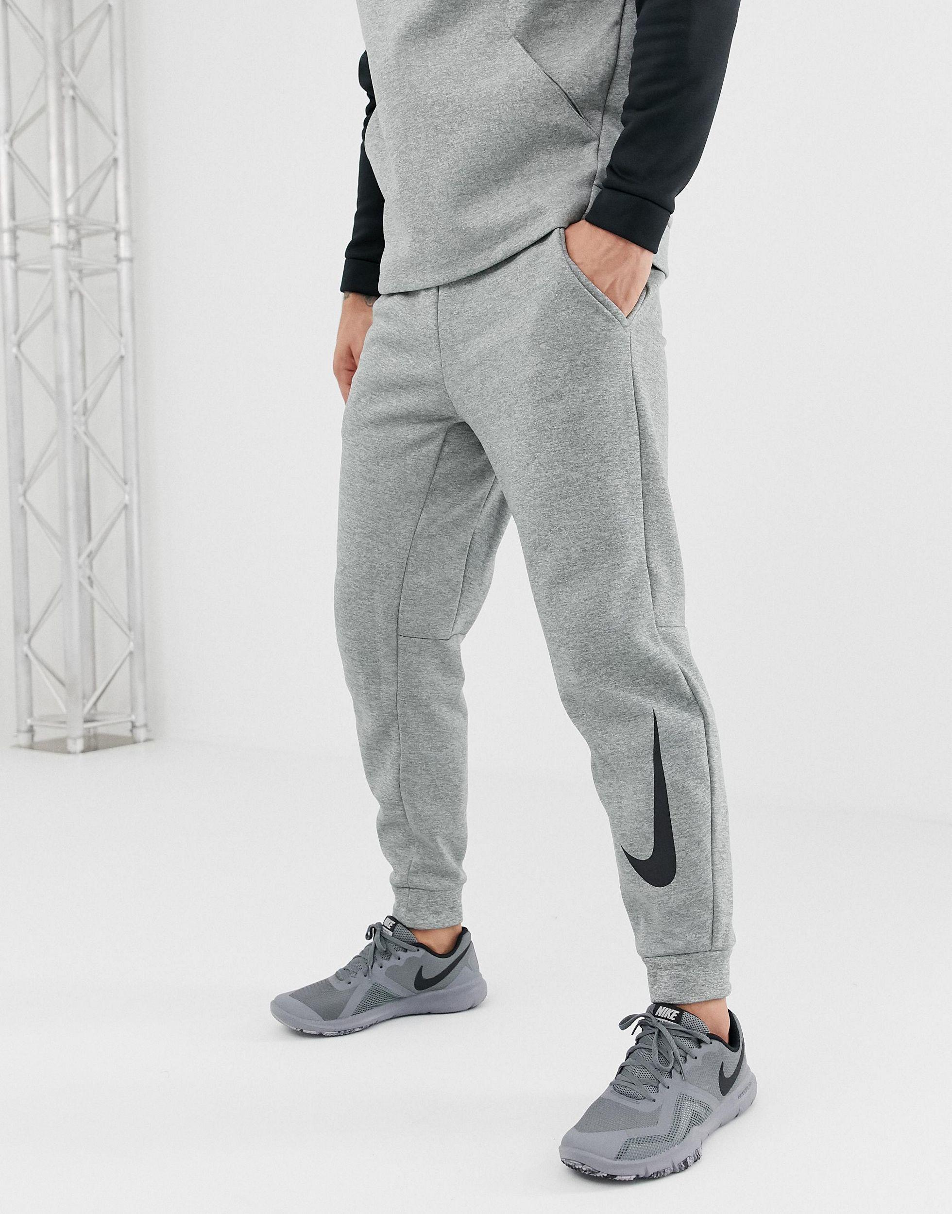 спортивные джоггеры найк мужские. Nike club fleece joggers. серые мужские спортивки. брюки спортивные nike bv5387. серые штаны найк мужские.