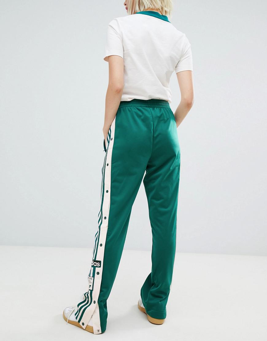 adidas Originals Three Stripe Popper Pant With Vintage Logo In Green - Lyst