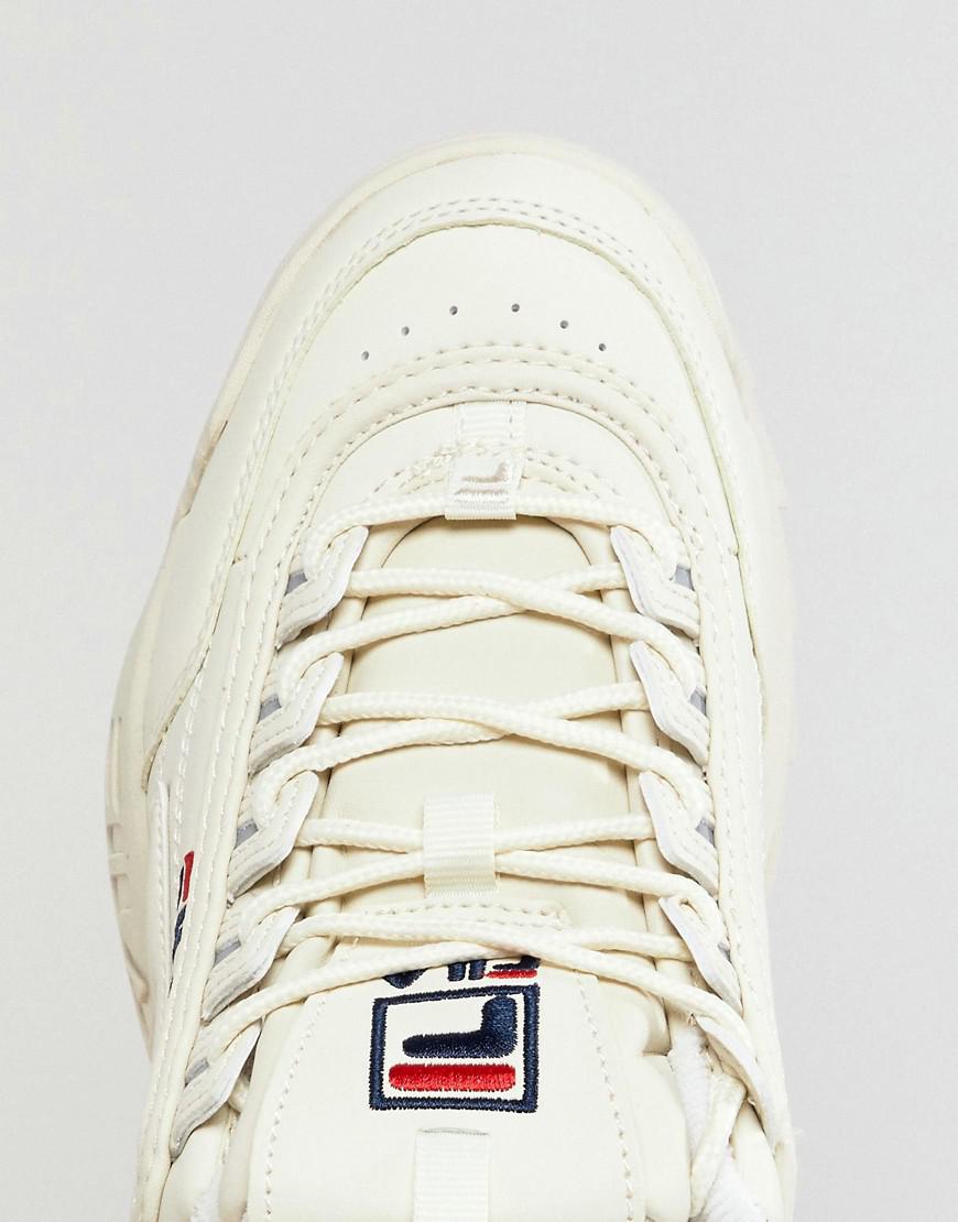 cream fila disruptor