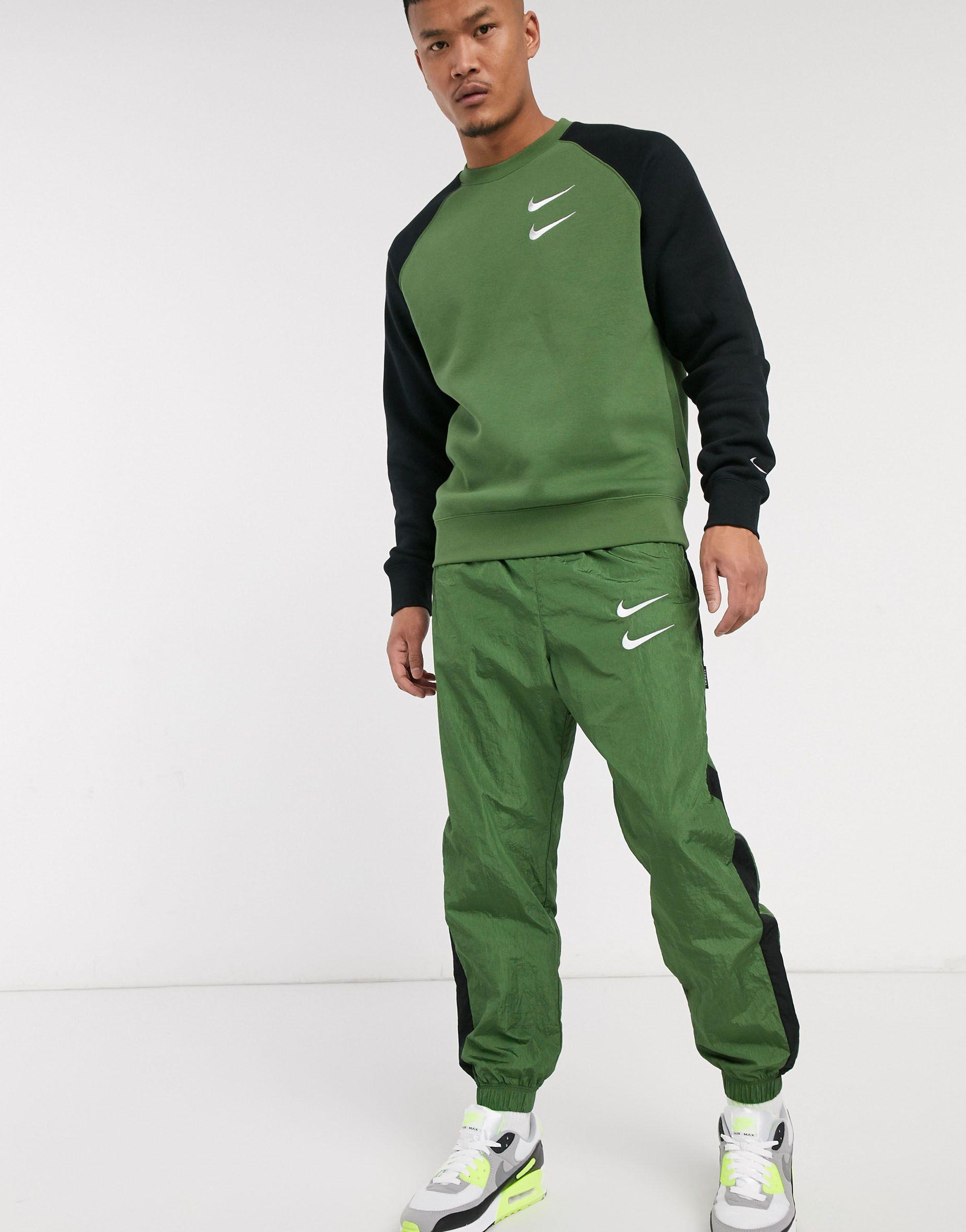 Manchuria Ligeramente Apretar Nike Double Swoosh Joggers in Green for Men | Lyst
