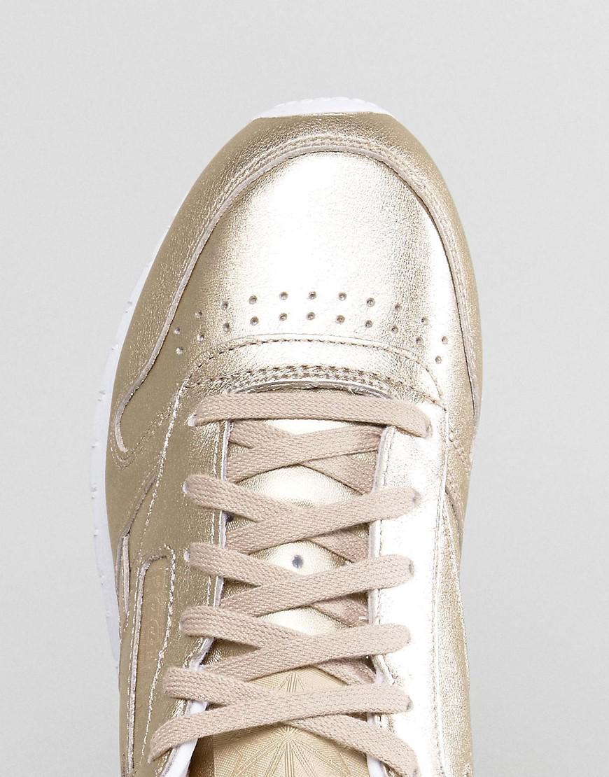 reebok classic leather metallic trainers in antique gold
