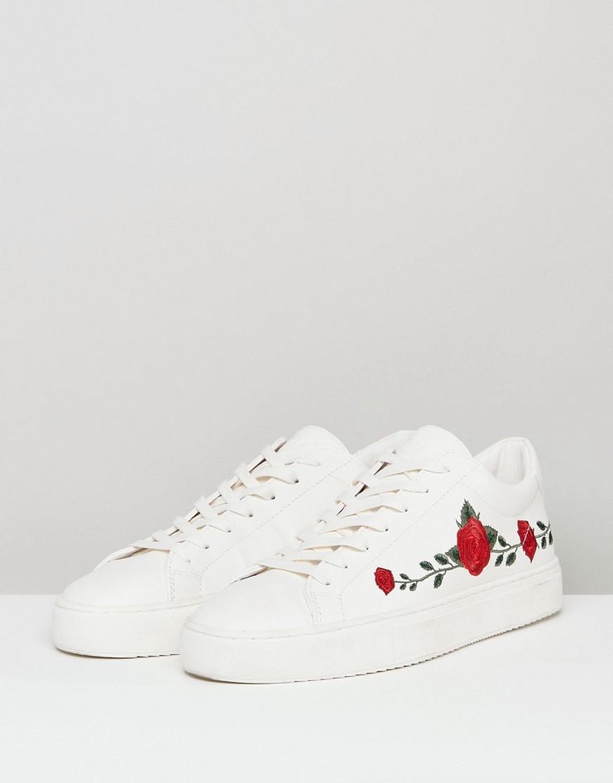 trainers with roses on them