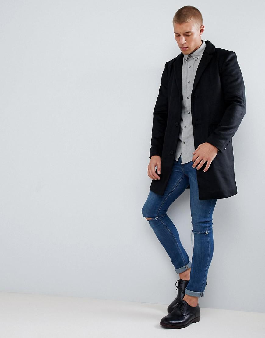 black overcoat with jeans