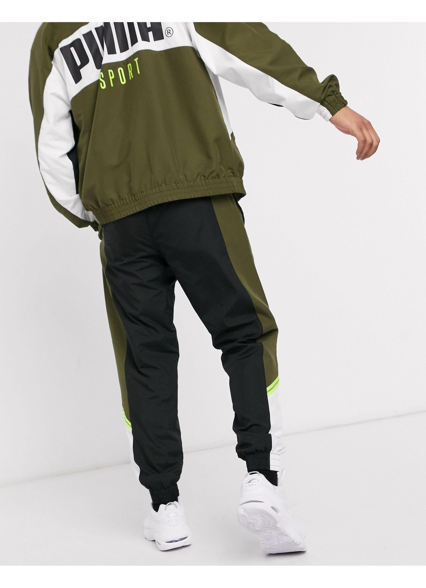 PUMA Tfs Woven joggers Khaki in Green for Men | Lyst
