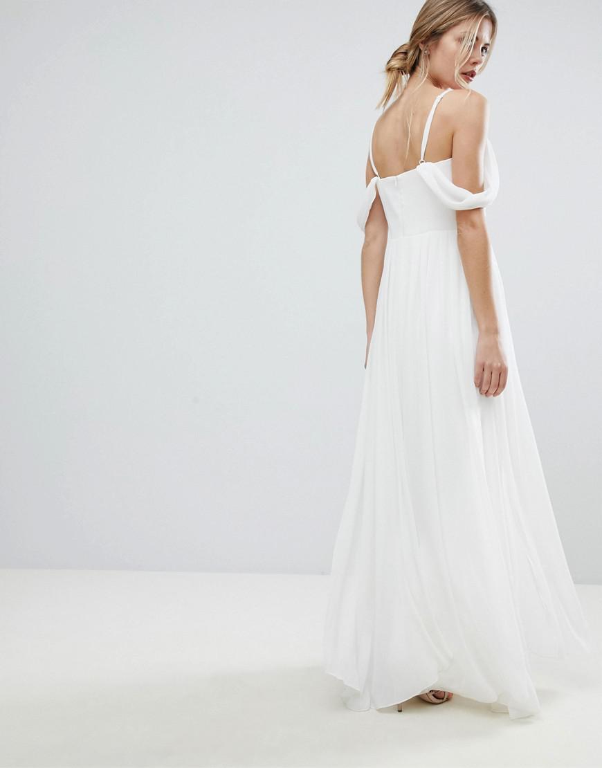 white floaty maxi dress