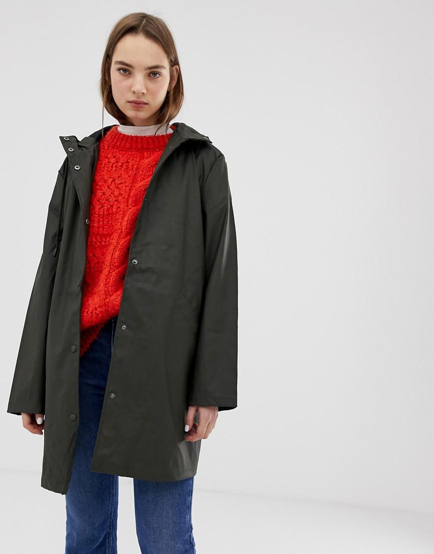 green rubber raincoat