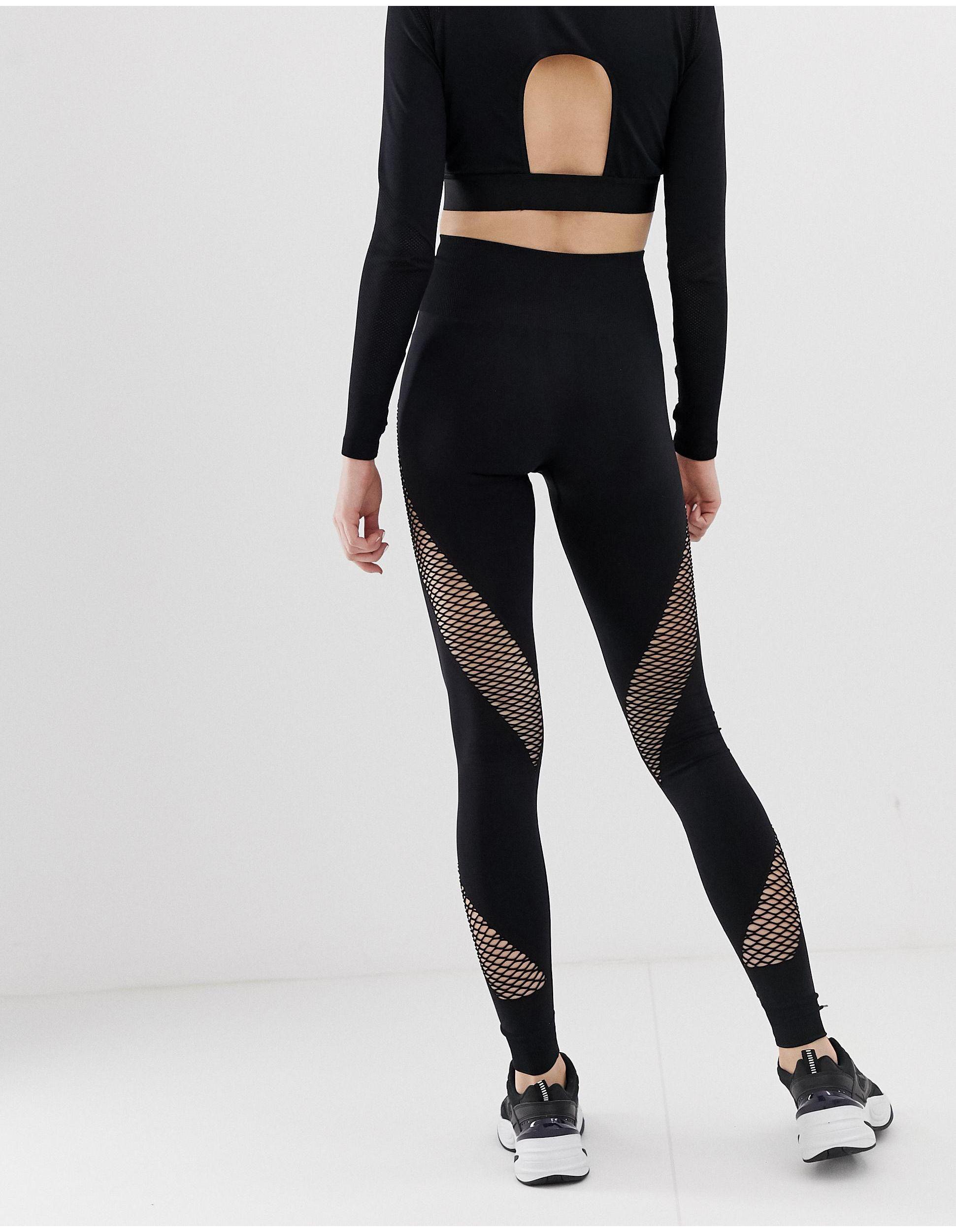Ivy Park Synthetic Active Mesh Panel Circular Knit Leggings in Black | Lyst