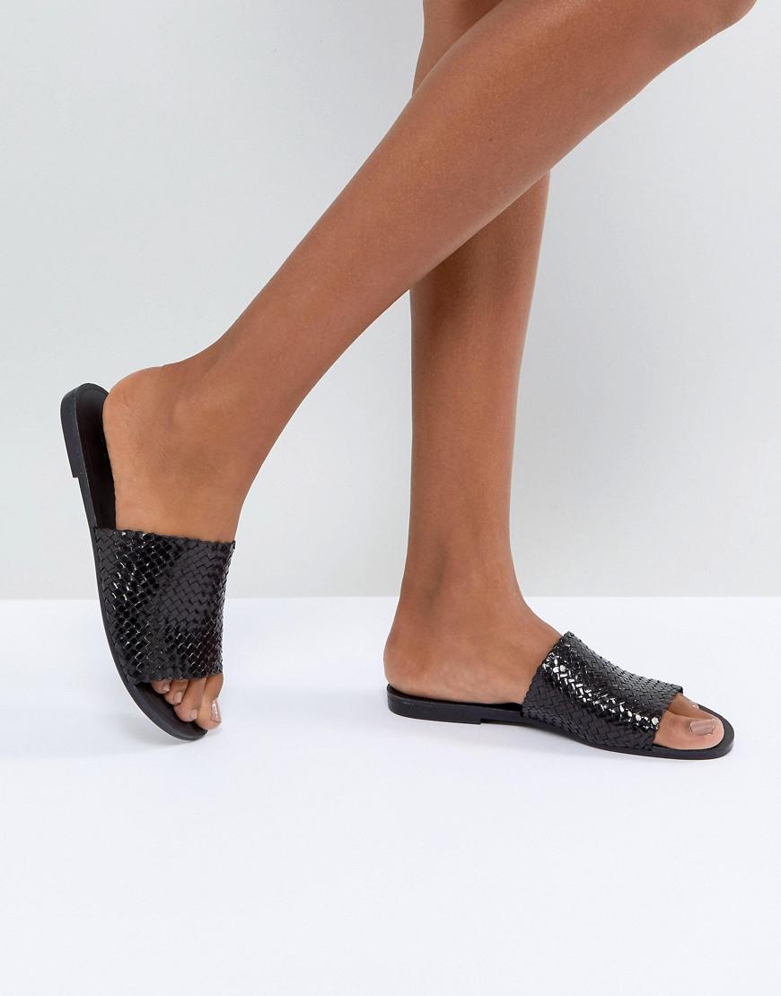black woven slides