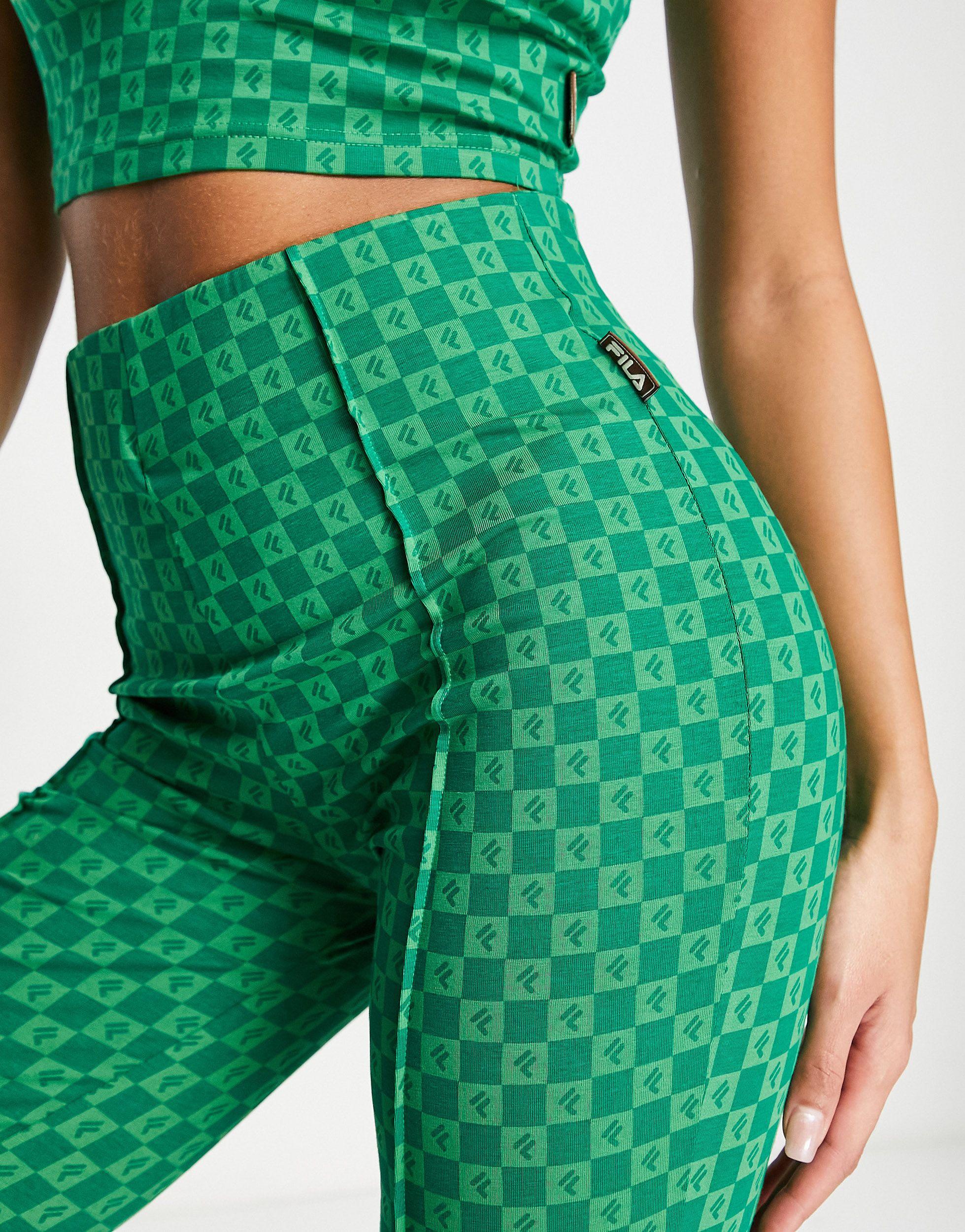 Fila Flare-broek Met Retro Print in het Groen | Lyst NL