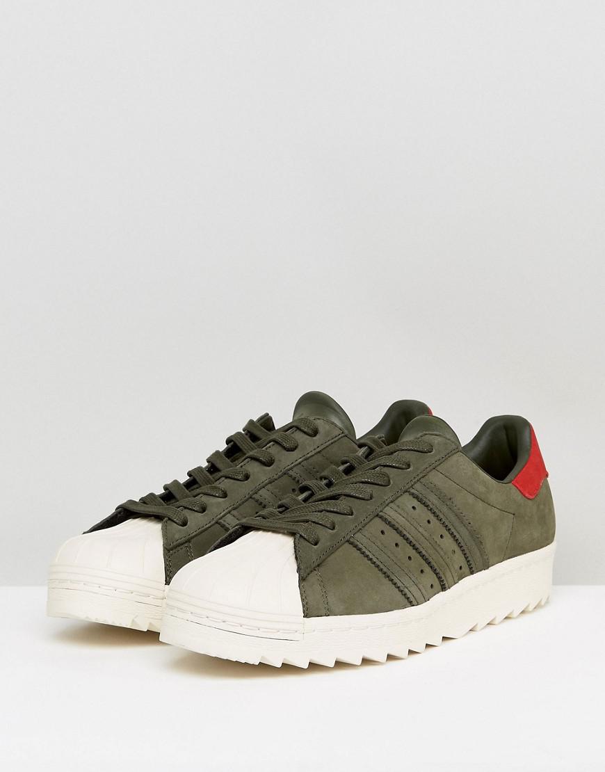 green adidas superstar trainers