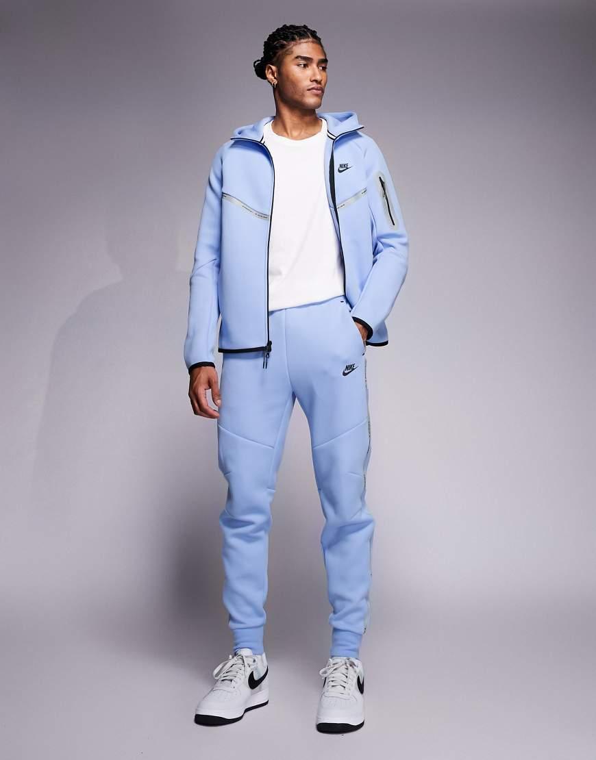 Joggers Azul Claro Con Detalle Reflectante Tech Fleece De Nike de