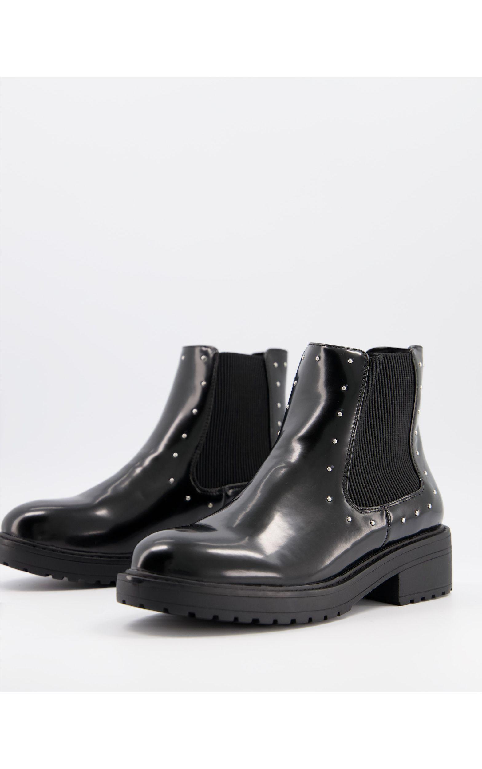 black flat stud boots
