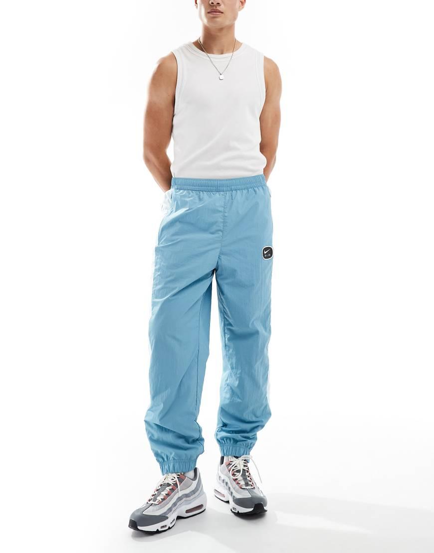 Nike Swoosh Air Woven Joggers in Blue for Men Lyst UK