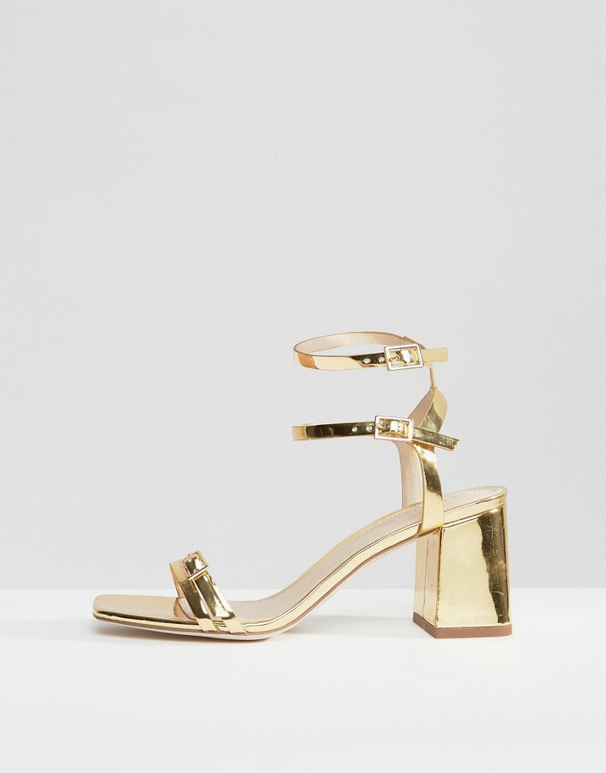 gold mid block heel sandals