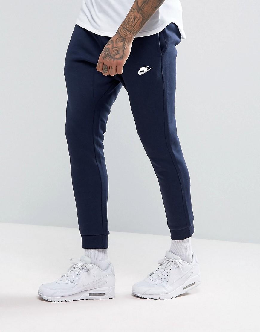 navy blue nike jogging suit
