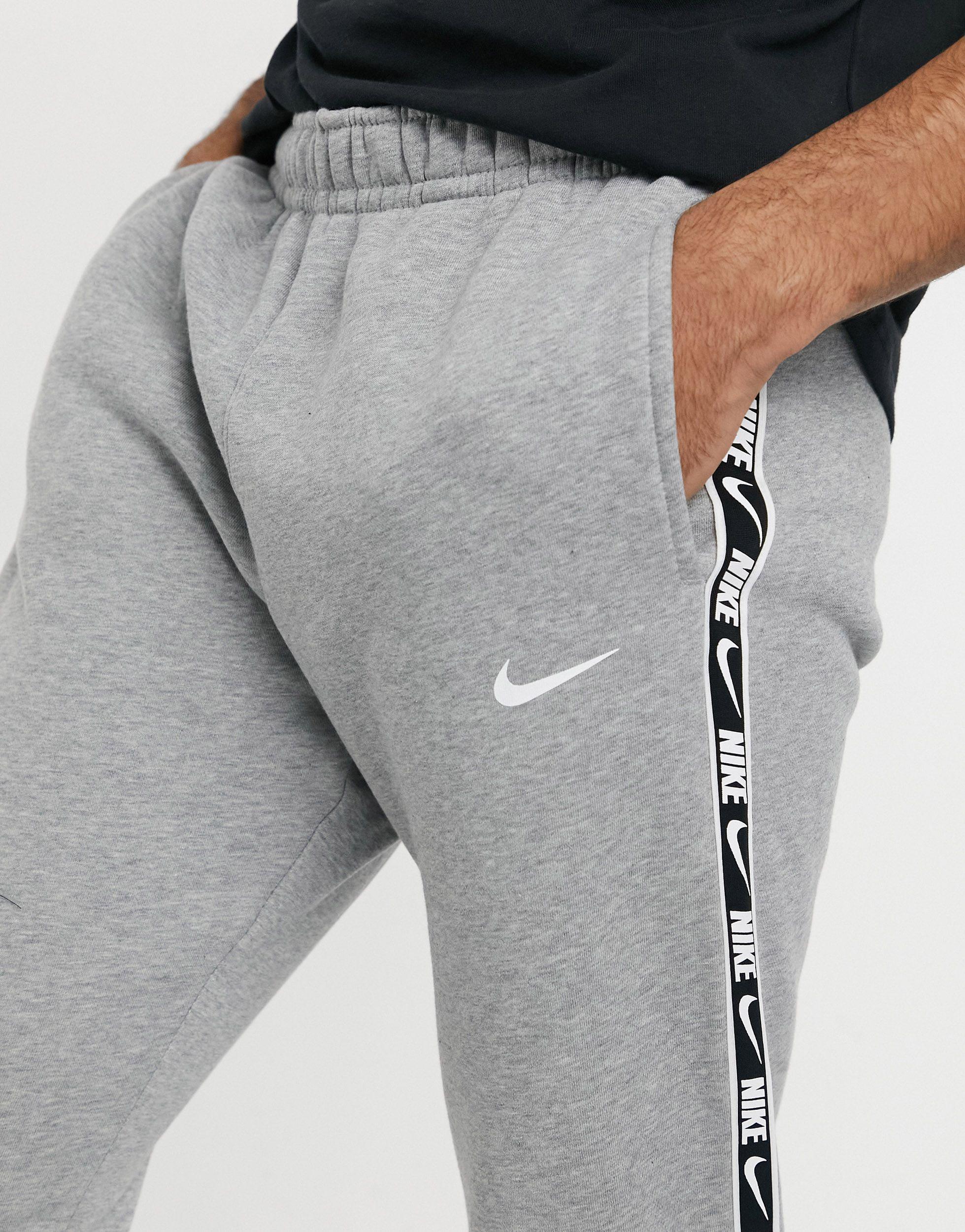 Nike Repeat Pack Taping Cuffed joggers in Grey for Men | Lyst UK