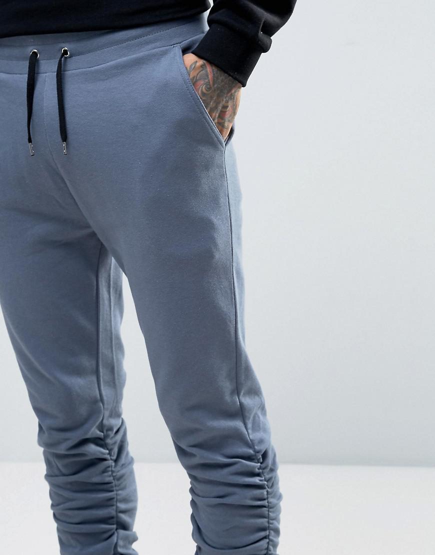 ASOS Skinny Stacked Joggers In Washed Blue for Men | Lyst