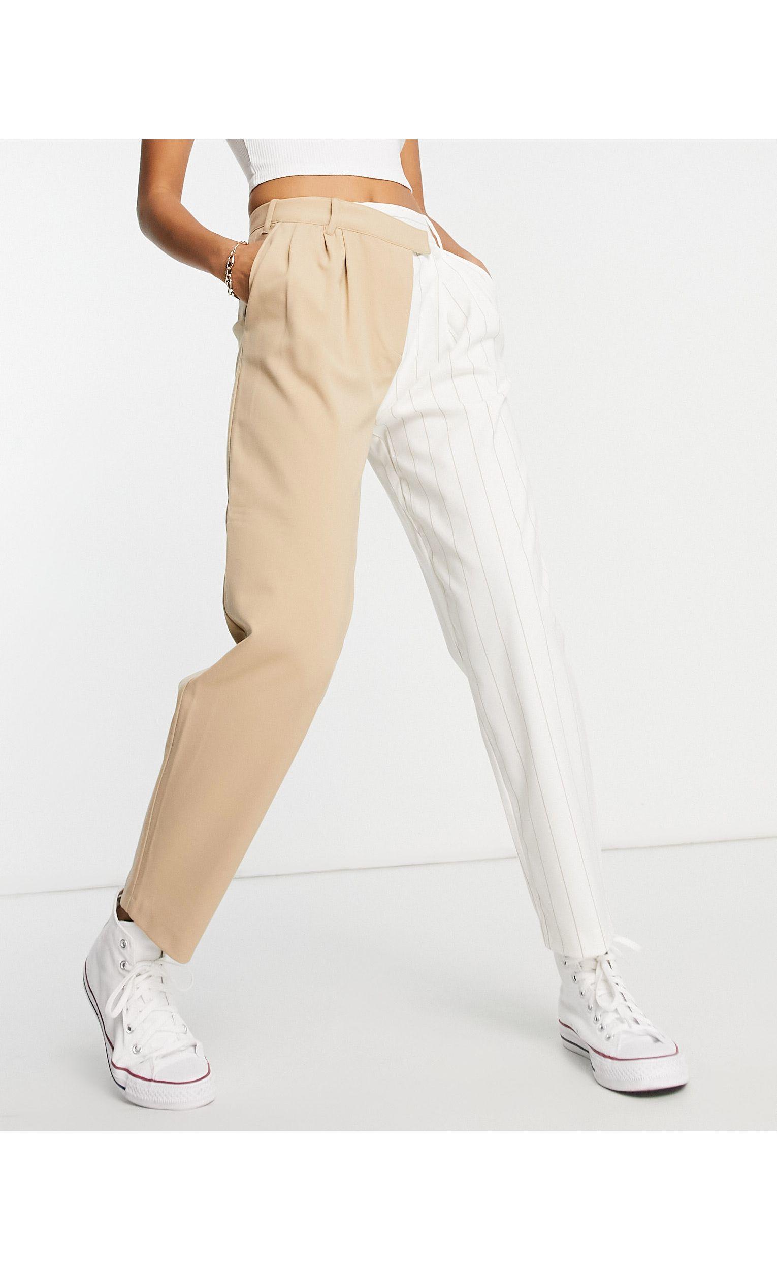 Pantaloni asimmetrici con vita a due altezze color cammelloBershka in  Materiale sintetico di colore Neutro | Lyst