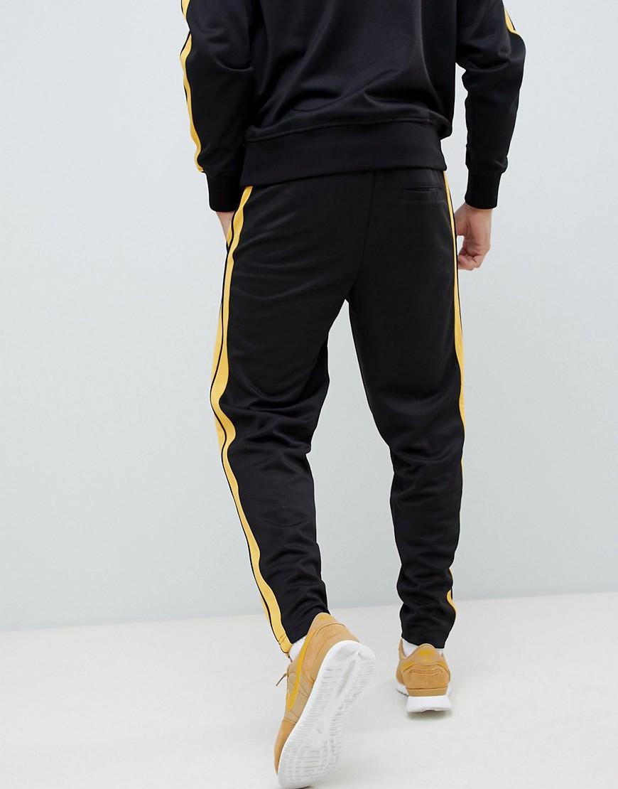 ellesse cassed track pants