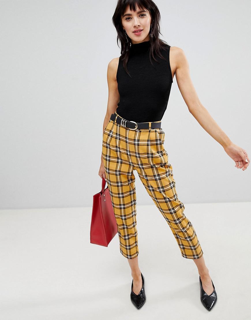 black and yellow checkered trousers