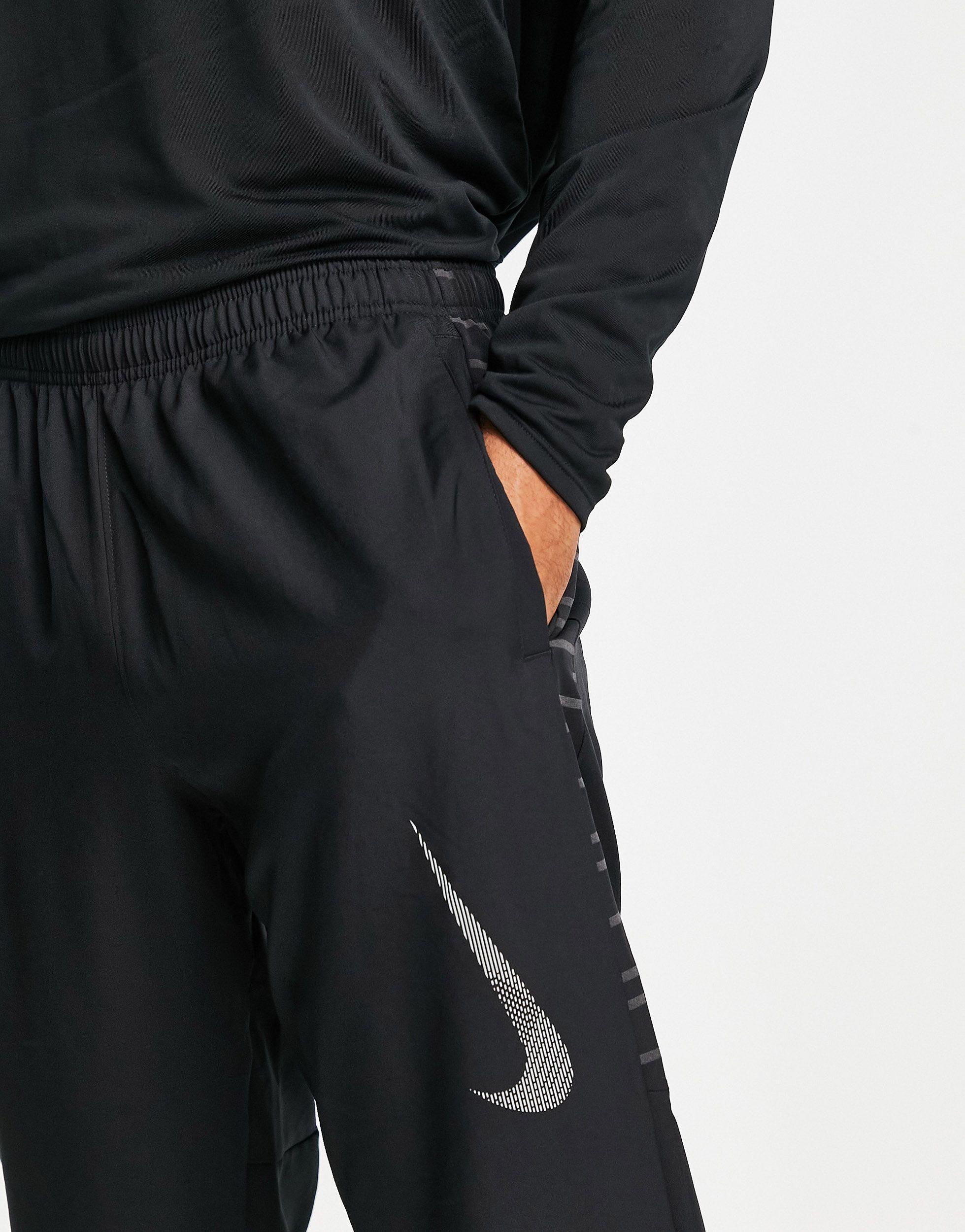 Nike Run Division Challenger Flash Woven jogger in Black for Men - Lyst