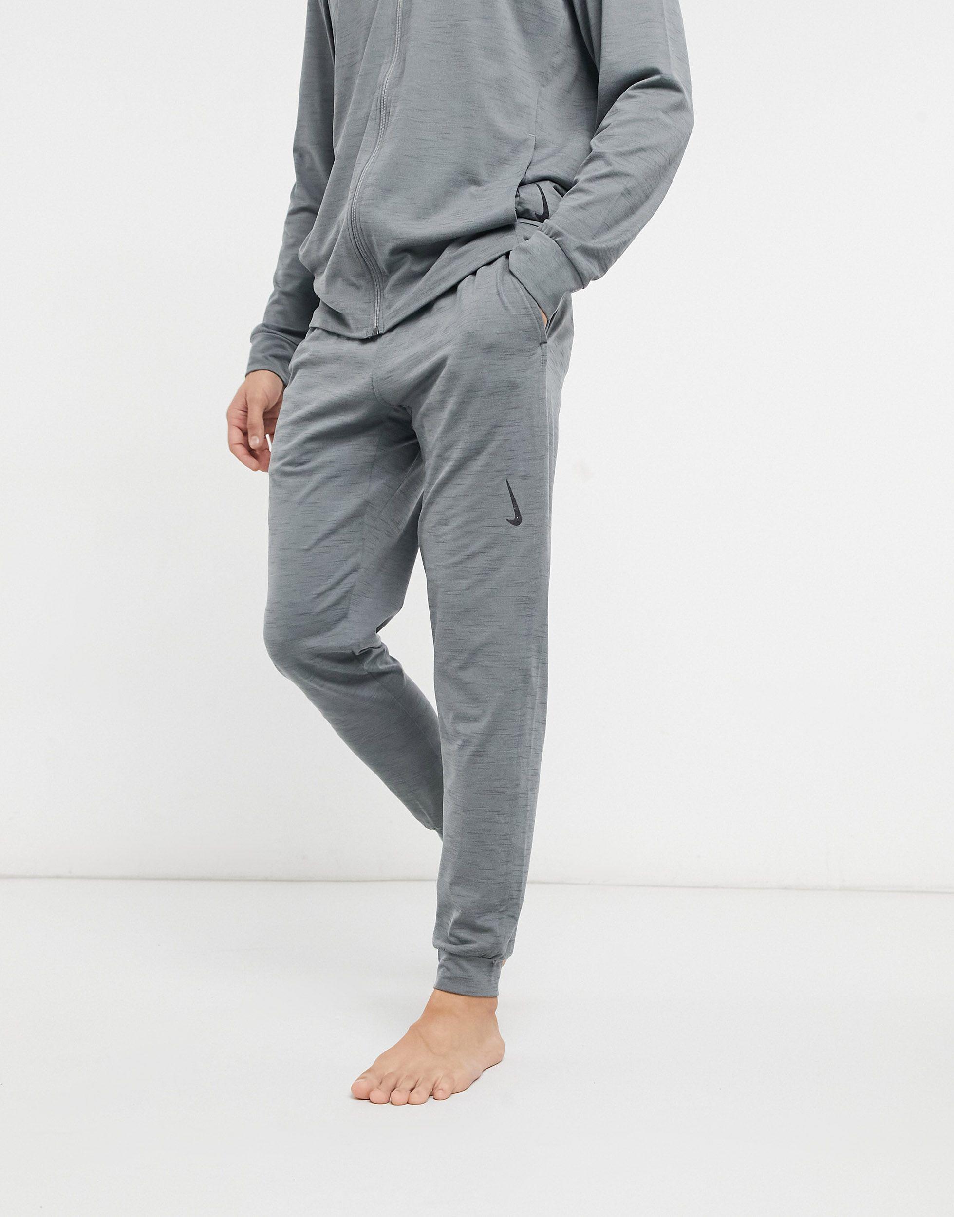 Nike Yoga Hyperdry Joggers In Grey