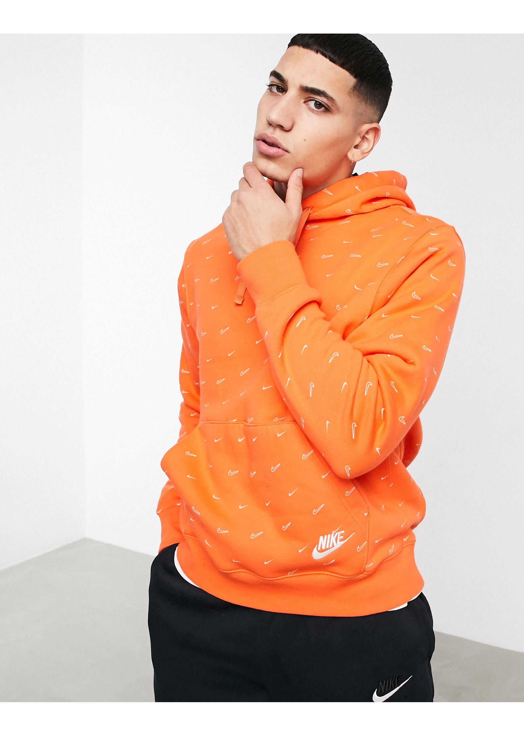 Nike All-over Swoosh Print Hoodie in Orange for Men | Lyst UK