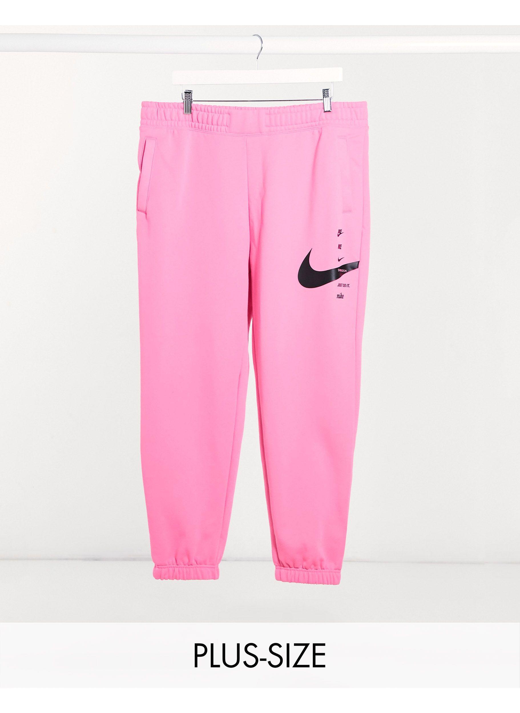 Nike Fleece Stacked Swoosh Logo Sweatpant in Pink | Lyst