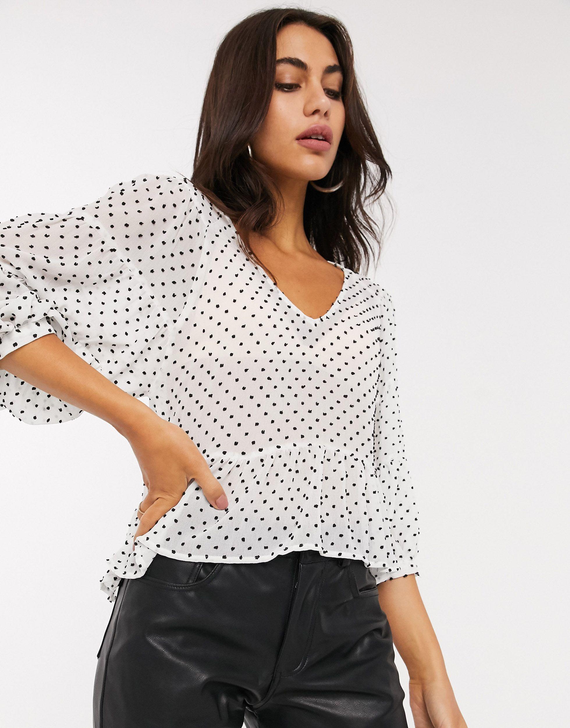 Blusa blanca peplum y lunares Stradivarius de color Blanco | Lyst