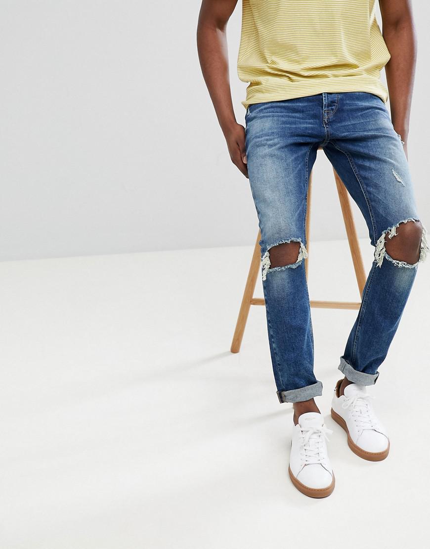 mens jeans knee rips
