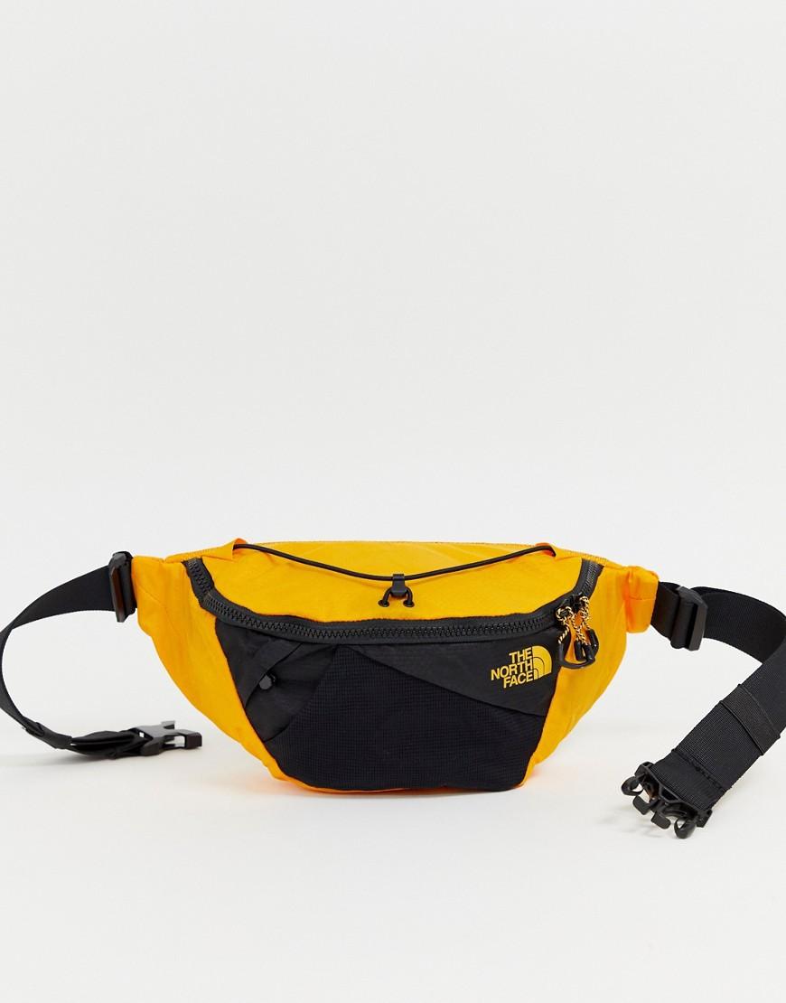 orange north face bum bag