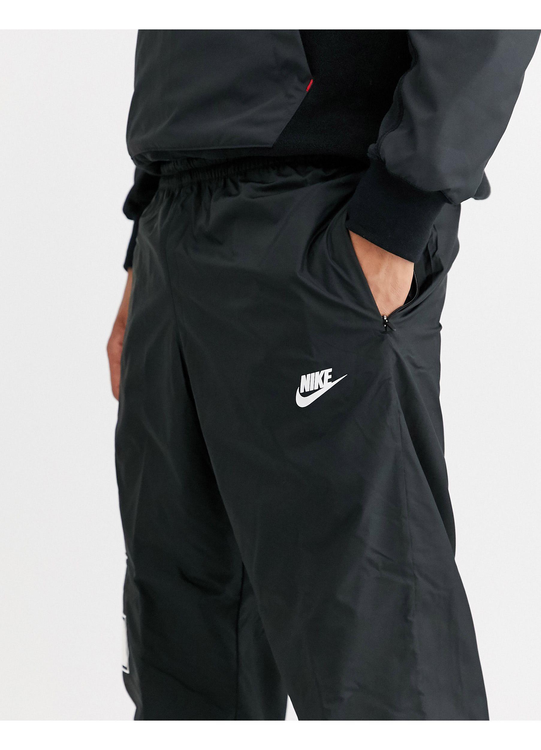 Nike Overbranded Cuffed joggers in Black for Men | Lyst UK