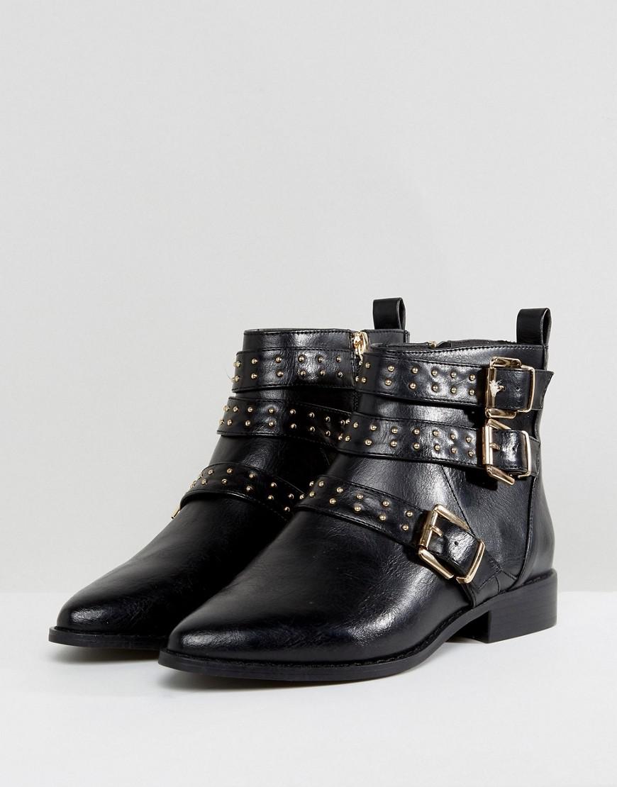 black flat stud boots