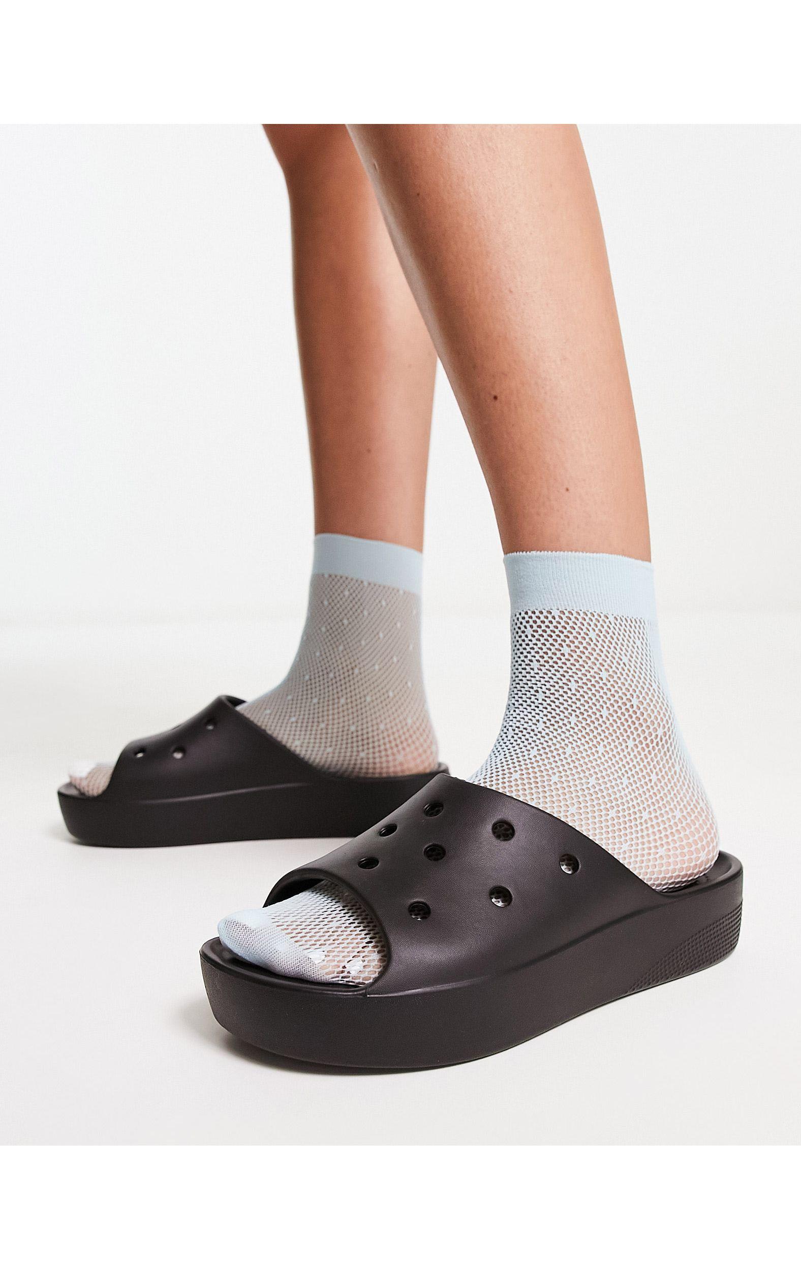 Sandalias negras sin cierres con plataforma de Crocs™ de color Blanco | Lyst