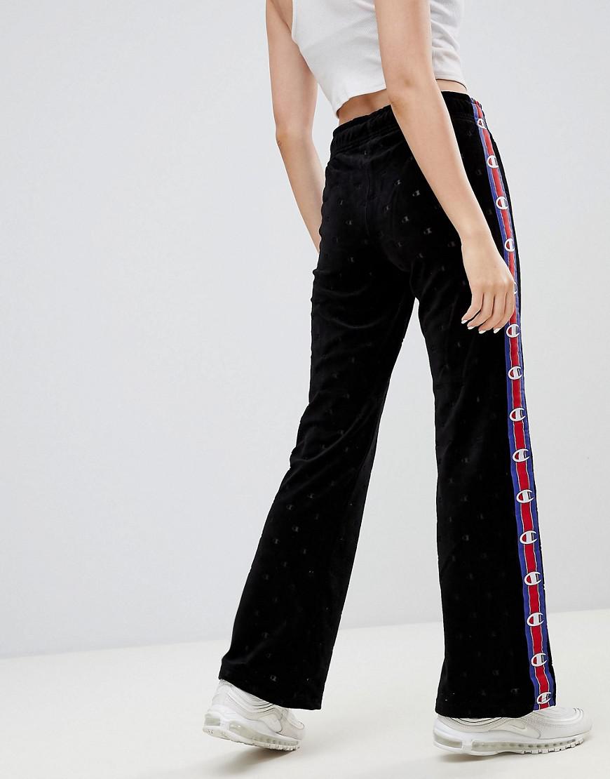 Champion Tracksuit Bottoms With All Over And Side In Velvet in Black - Lyst