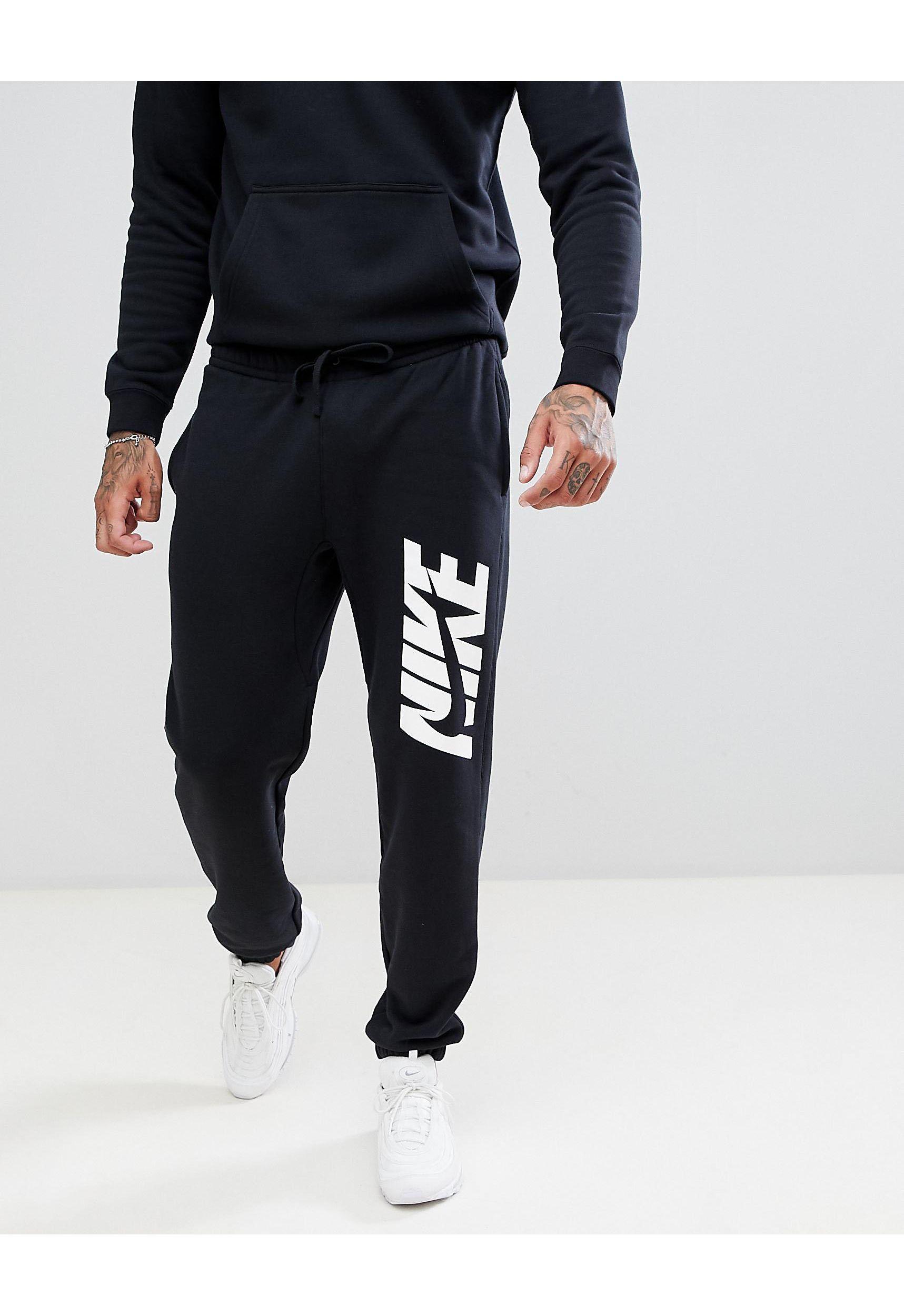 Костюмы с надписями мужские. Спортивный костюм Nike NSW Trk Suit FLC GX JDI. Спортивный костюм Nike Tracksuit. Найк костюм мужской 2021. Nike найк мужской спортивный костюм bv3025.