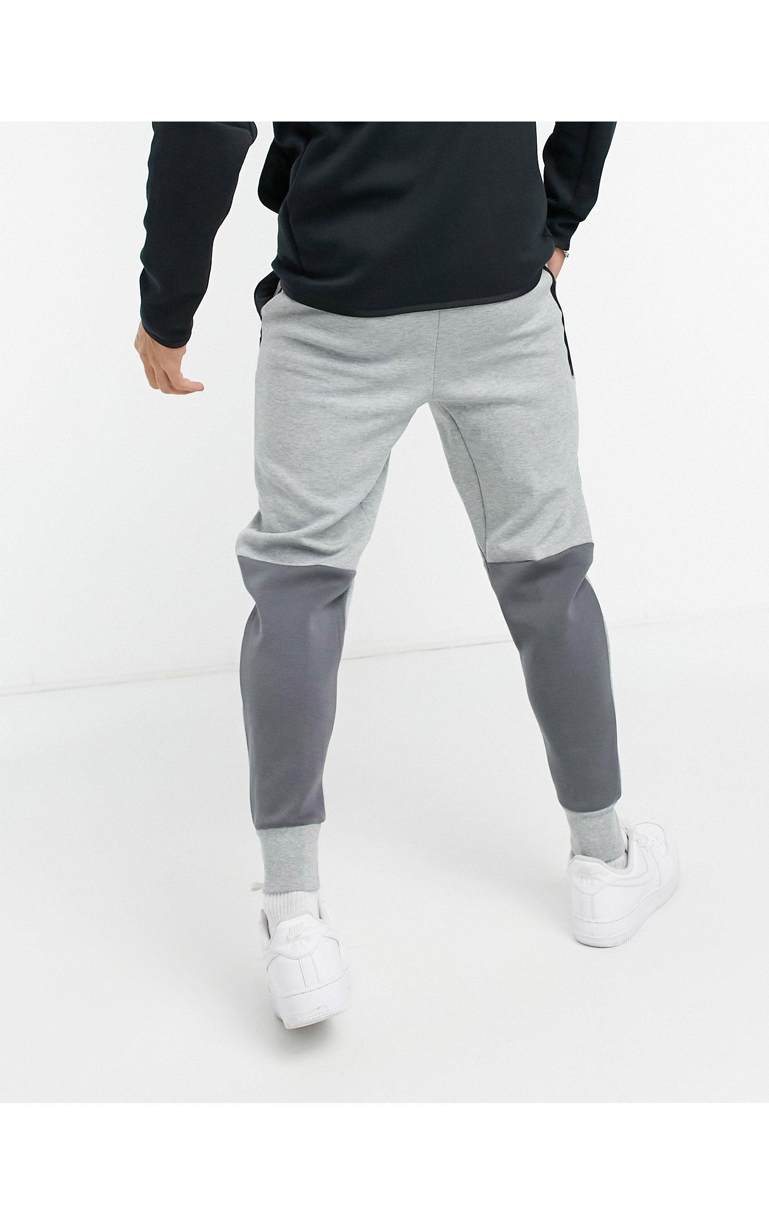 nike tech fleece colourblock joggers in grey