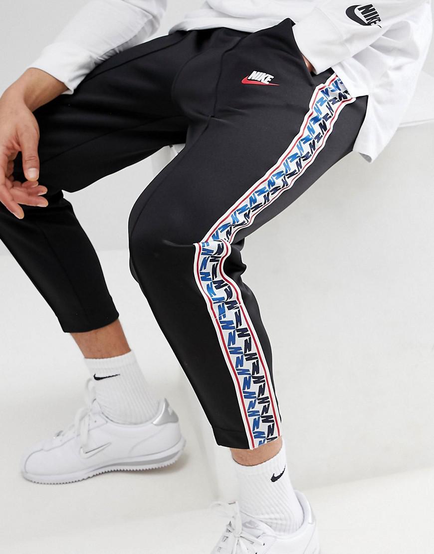 Nike Joggers With Taped Side Stripe In Regular Fit Black for Men | Lyst UK