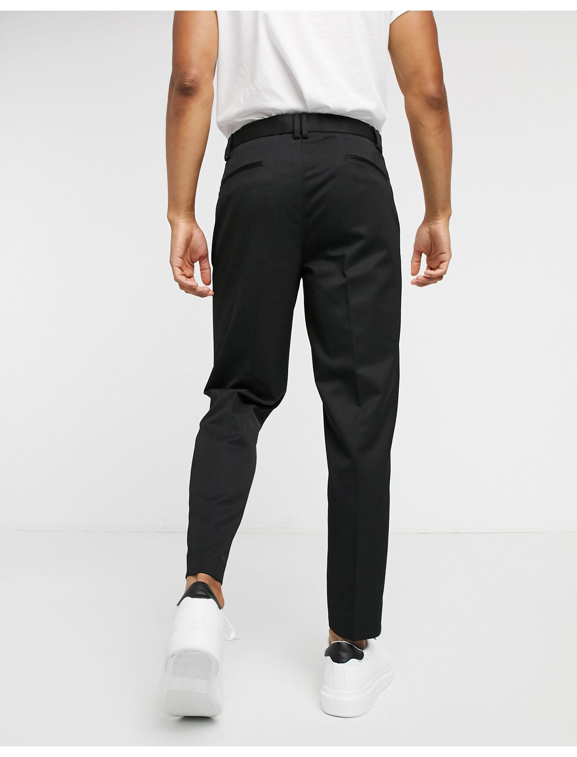 The Return of Mens Pleated Trousers