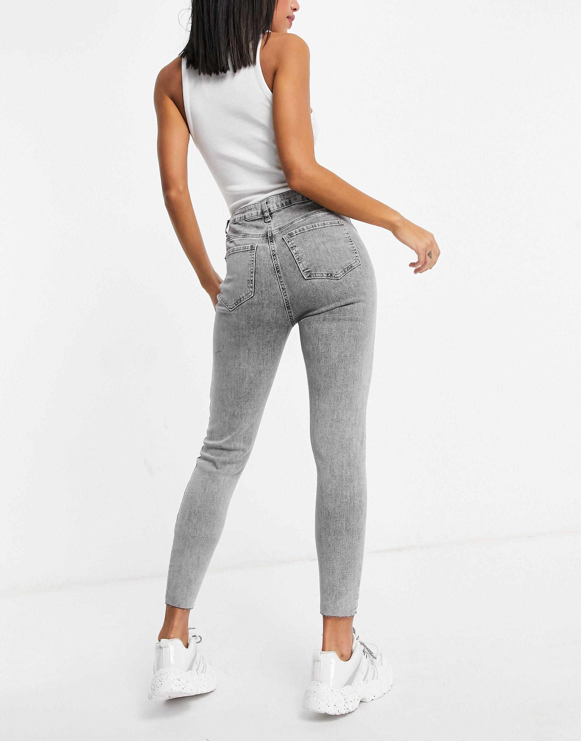 Jeans asimmetrici con bottoni lavaggio acidoMissguided in Denim di colore  Grigio | Lyst