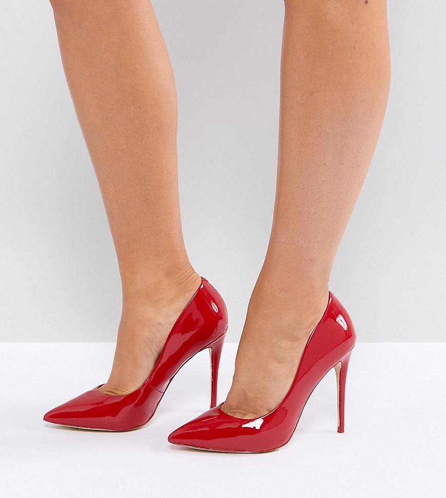 red pointed court shoes